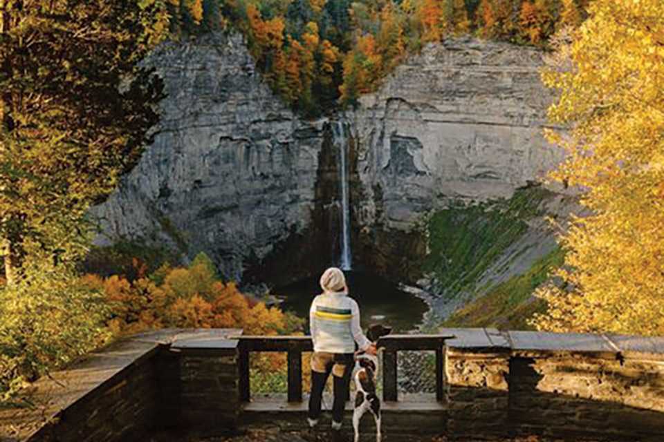 Person and dog hiking in the Finger Lakes Region in west-central, New York (photo © Adventures.with.Willow/Finger Lakes Tourism Alliance) Person and dog hiking in the Finger Lakes Region in west-central, New York (photo © Adventures.with.Willow/Finger Lakes Tourism Alliance)