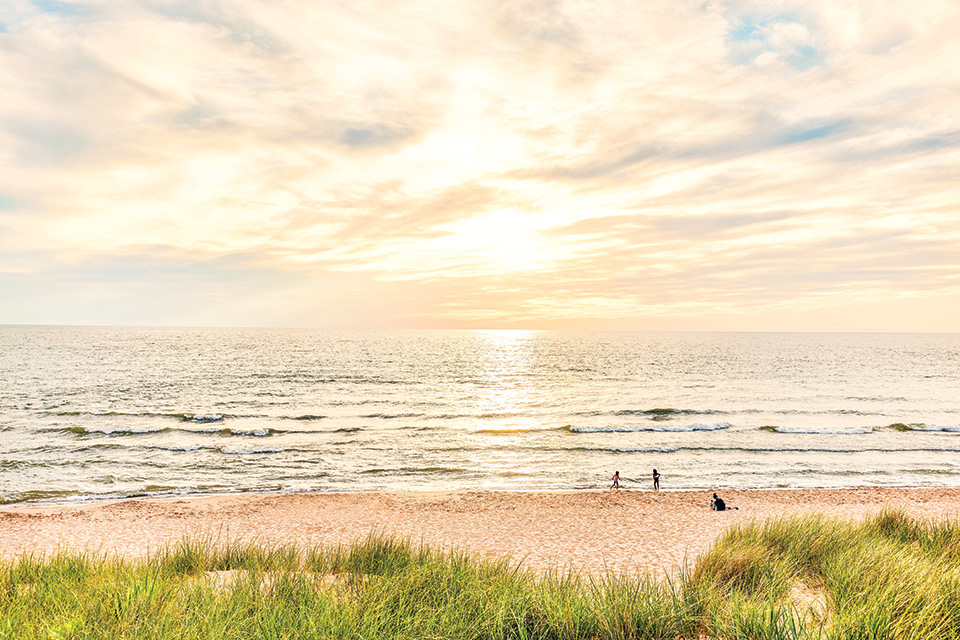 Oval Beach in Saugatuck, Michigan at sunset (photo courtesy of Saugatuck Douglas Area Convention & Visitors Bureau) Oval Beach in Saugatuck, Michigan at sunset (photo courtesy of Saugatuck Douglas Area Convention & Visitors Bureau)